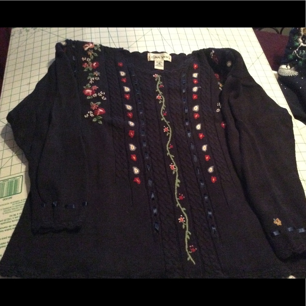 Navy blue sweater with embroidery flower design